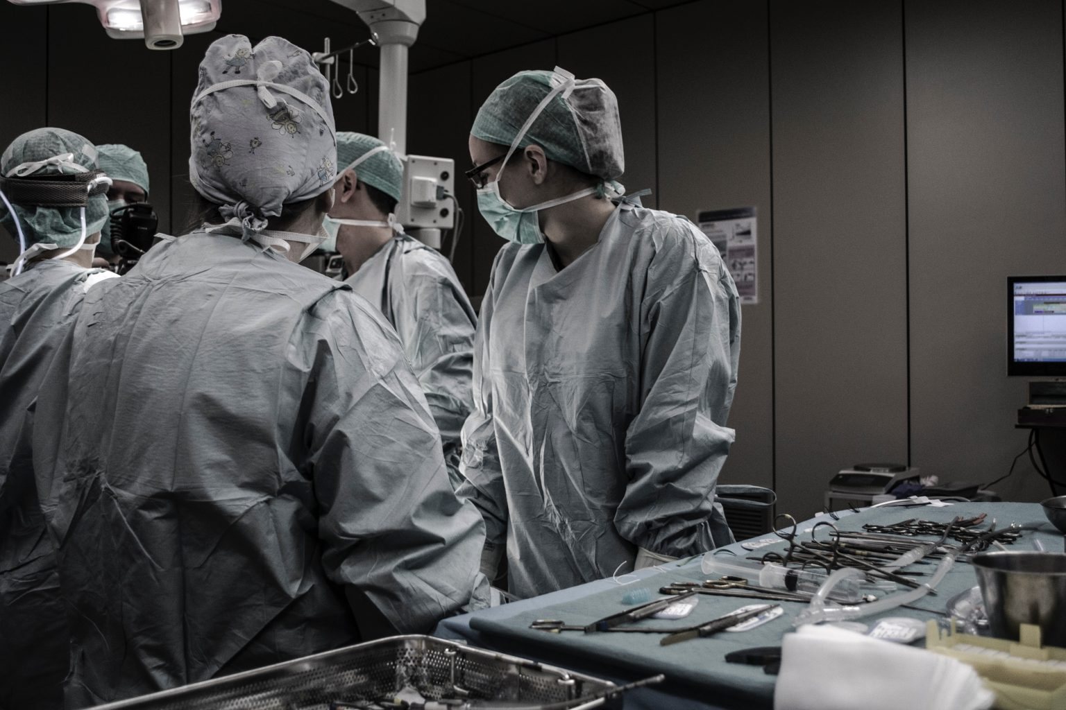 Clinical team working together in a surgical environment